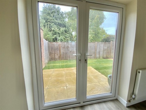 Patio doors open to the garden