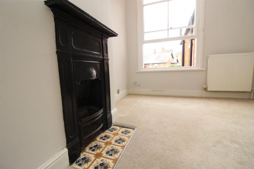Bedroom 2 Fireplace.JPG
