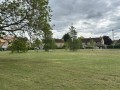 View to the house across the green